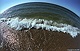 Golven op strand bij Oostkapelle 1, met fish-eye objectief Nikon f16 mm